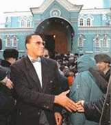 Min. Farrakhan shakes hands with well-wishers and believers outside Moscow's Central Mosque, Jan 29.